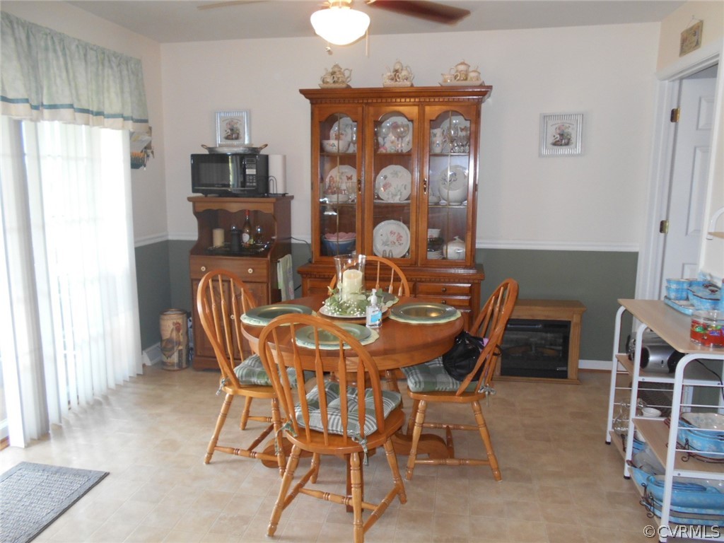 1231 Snapps Mill Road Spout Spring, VA 24593 - Photo 11 of 28 a view of a dining room with furniture