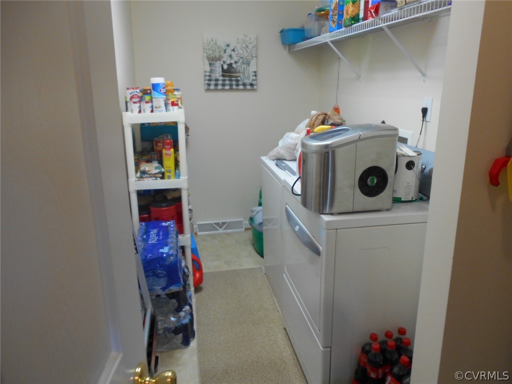 1231 Snapps Mill Road Spout Spring, VA 24593 - Photo 21 of 28 a utility room with dryer and washer