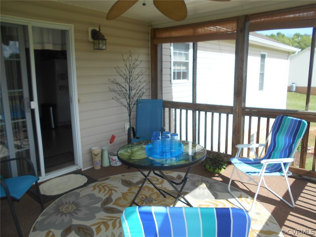 1231 Snapps Mill Road Spout Spring, VA 24593 - Photo 23 of 28 a view of a chairs and table in patio