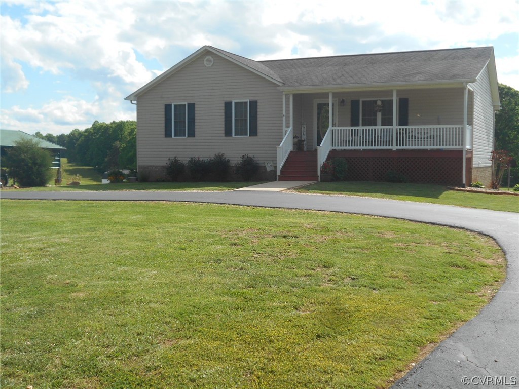 1231 Snapps Mill Road Spout Spring, VA 24593 - Photo 4 of 28 a swimming pool with outdoor seating and yard