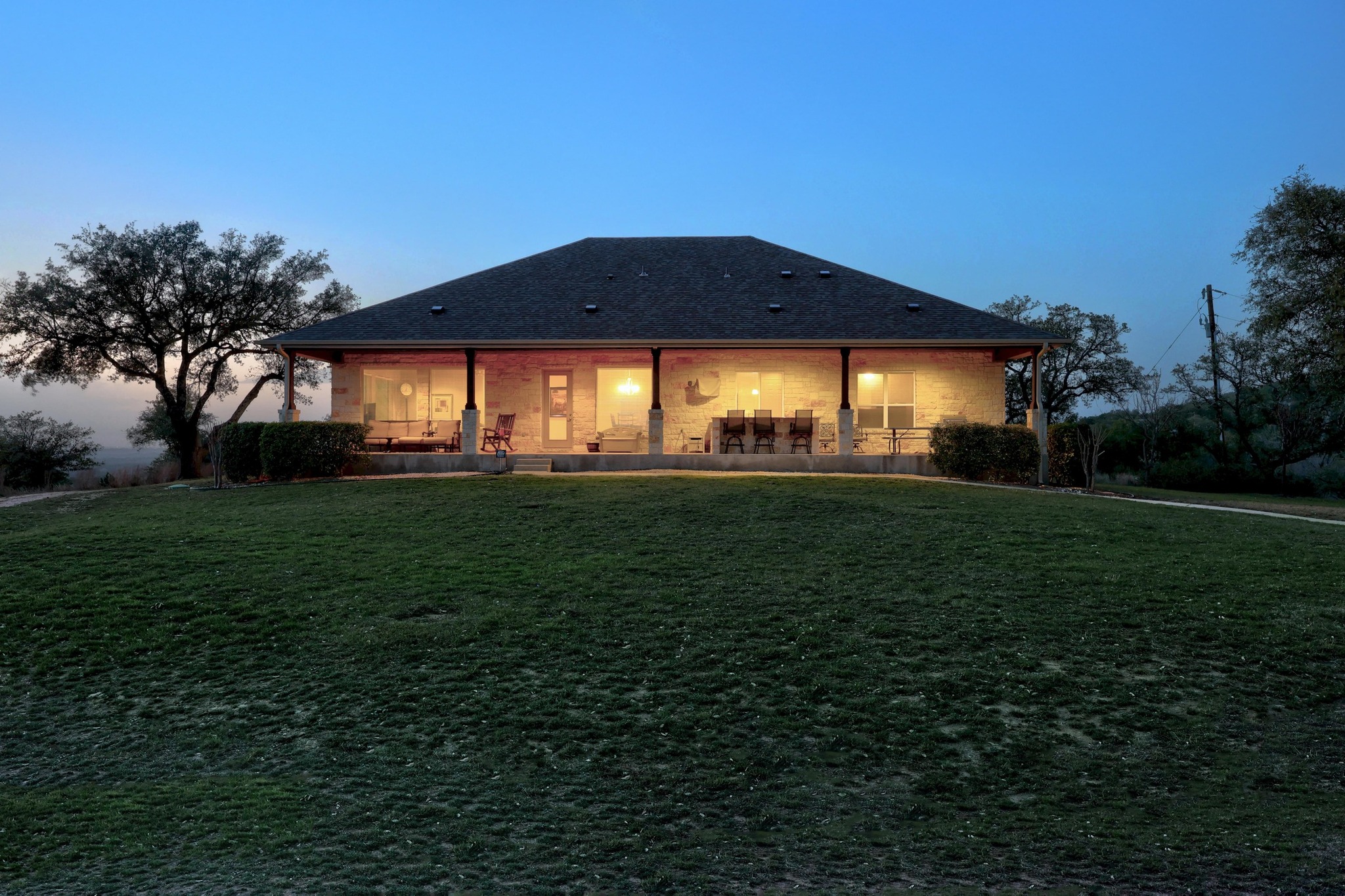 28701 Valley Road Marble Falls, TX 78654 - Photo 26 of 35 a view of a house with a yard