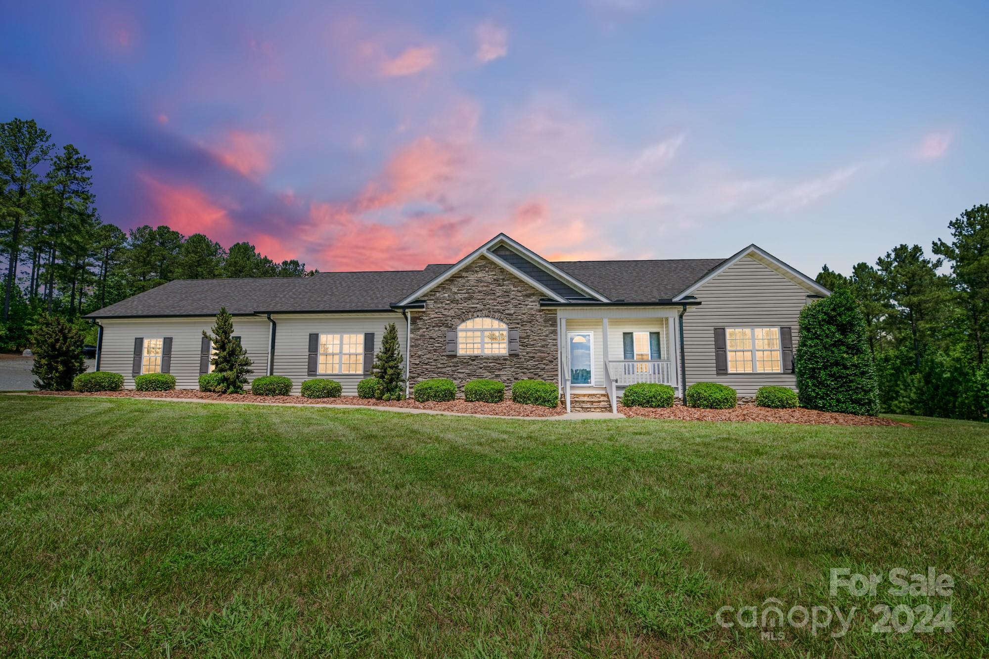 4640 Emanuel Road Gold Hill, NC 28071 - Photo 1 of 48 a front view of a house with a yard and garage