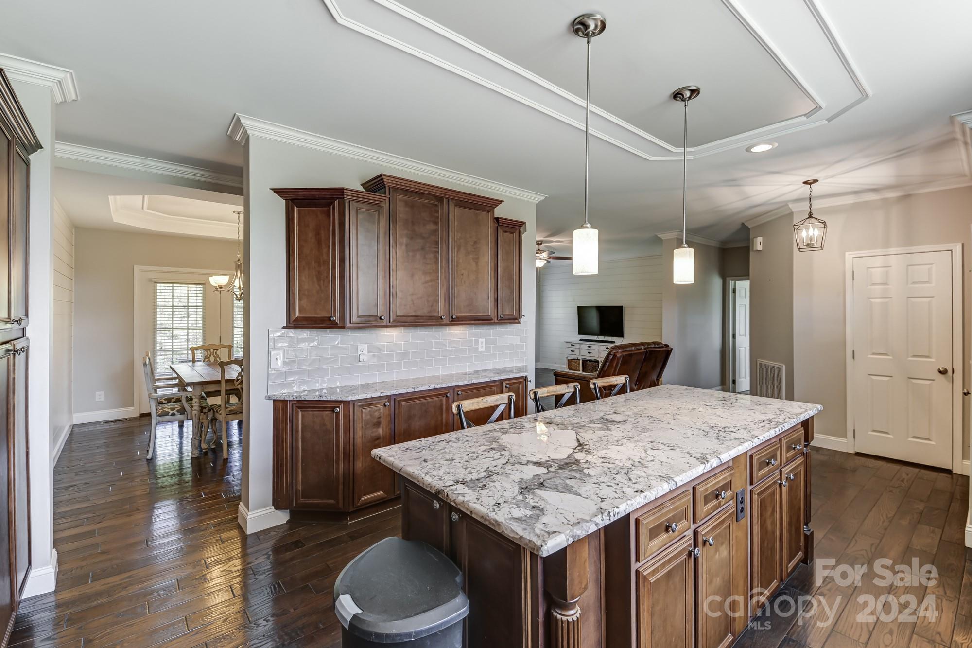 4640 Emanuel Road Gold Hill, NC 28071 - Photo 18 of 48 a kitchen with a table and chairs in it