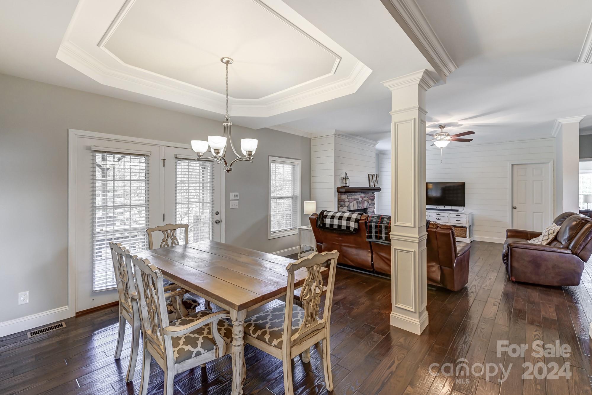 4640 Emanuel Road Gold Hill, NC 28071 - Photo 21 of 48 a view of a dining room with furniture window and wooden floor