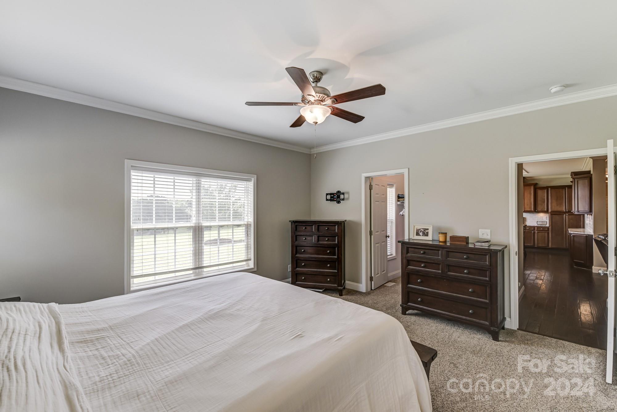 4640 Emanuel Road Gold Hill, NC 28071 - Photo 25 of 48 a bedroom with a bed and a television