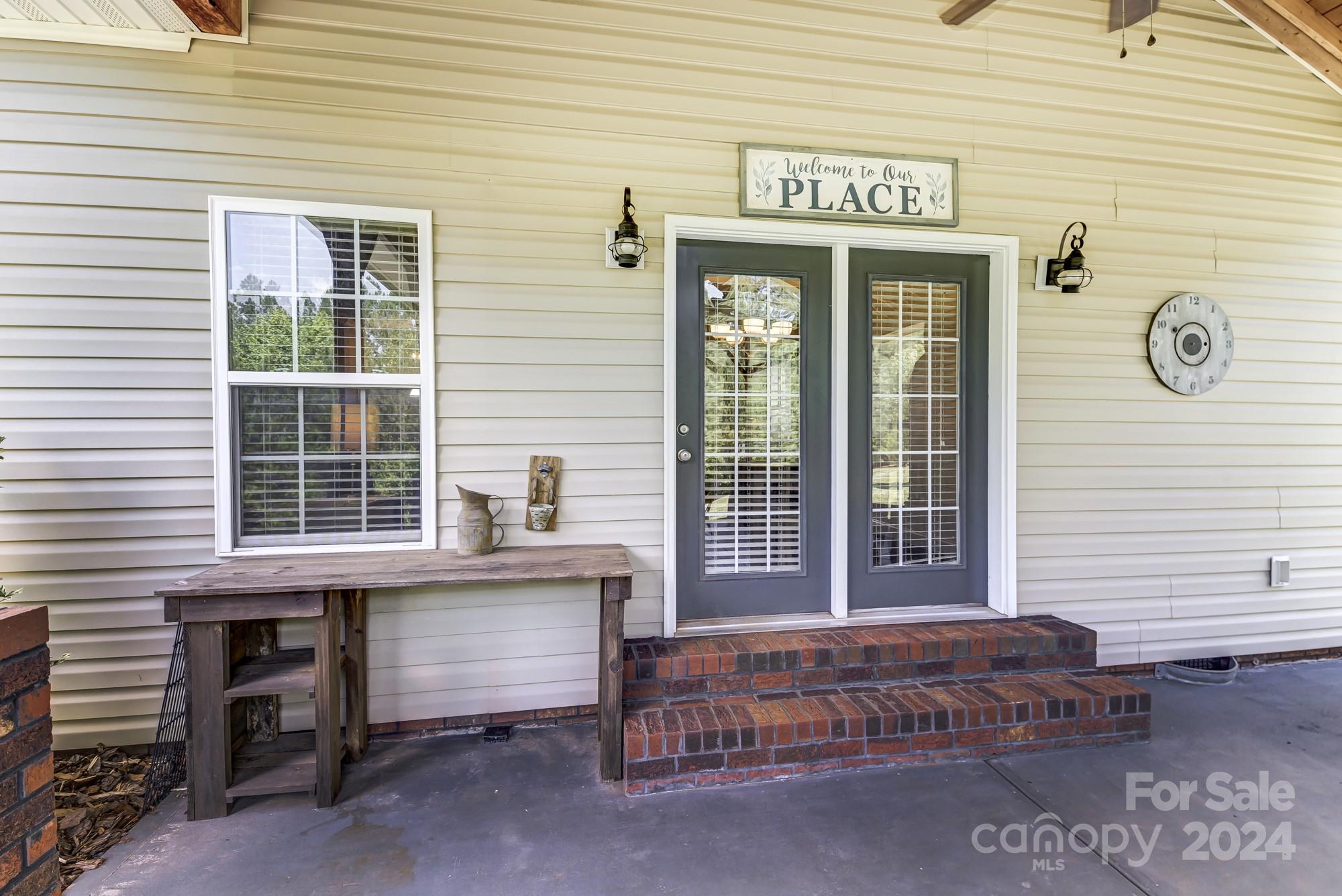 4640 Emanuel Road Gold Hill, NC 28071 - Photo 42 of 48 a view of a brick house with a large window