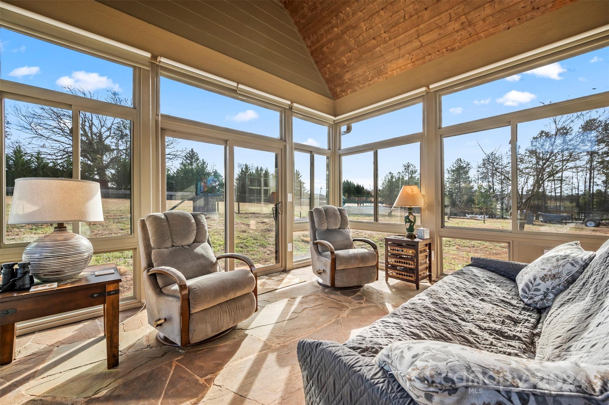 577 Edwards Road Columbus, NC 28722 - Photo 6 of 34 a living room with furniture and a large window