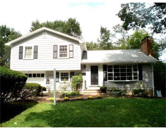 65 Follen Road Lexington, MA 02420 - Photo 1 of 23 a front view of a house with a yard