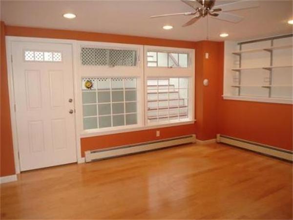 65 Follen Road Lexington, MA 02420 - Photo 12 of 23 an empty room with windows and fan