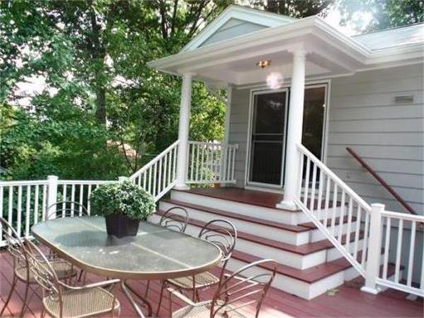 65 Follen Road Lexington, MA 02420 - Photo 19 of 23 a balcony with table and chairs