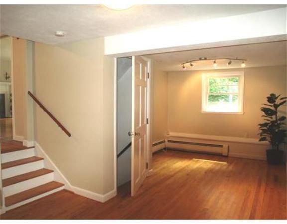 65 Follen Road Lexington, MA 02420 - Photo 7 of 23 a view of an entryway with wooden floor