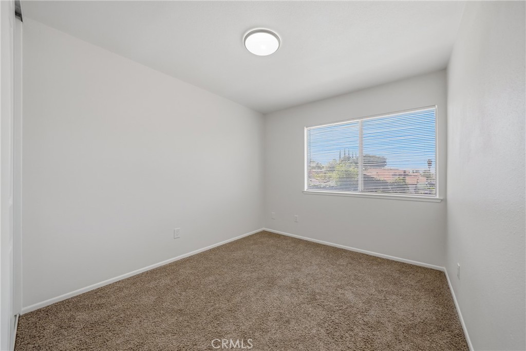 3469 Columbia Avenue Riverside, CA 92501 - Photo 17 of 31 an empty room with windows