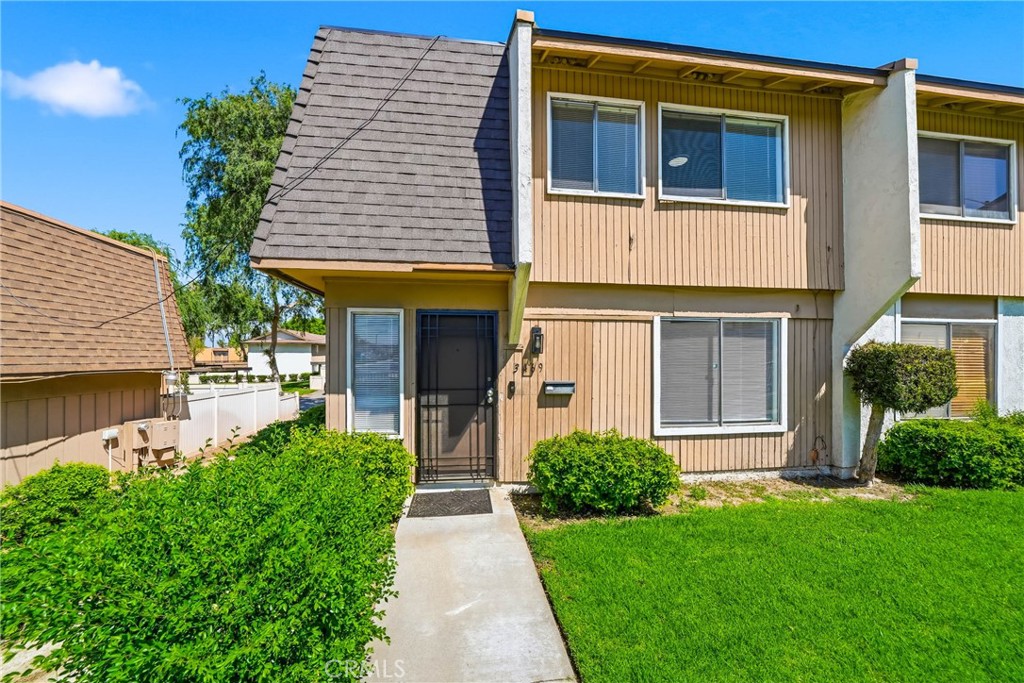 3469 Columbia Avenue Riverside, CA 92501 - Photo 2 of 30 a view of a house with potted plants and a yard