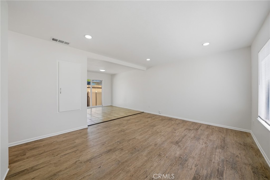3469 Columbia Avenue Riverside, CA 92501 - Photo 4 of 30 a view of empty room with wooden floor