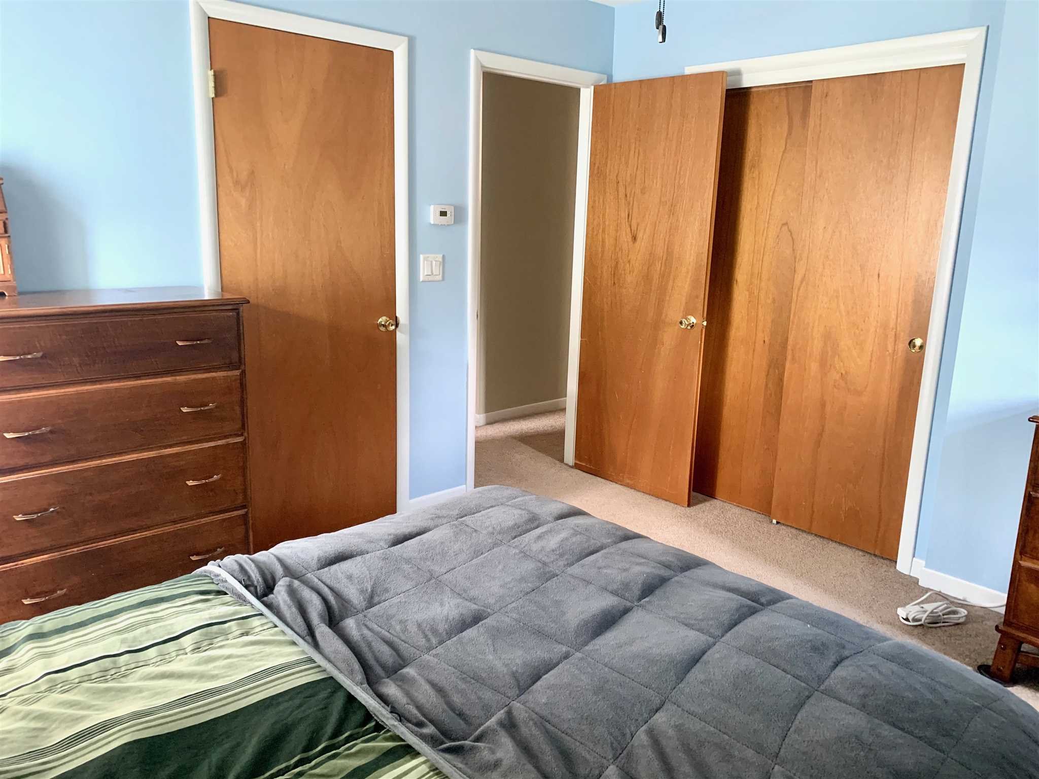 6 Academy Street Beacon, NY 12508 - Photo 14 of 22 a bedroom with a bed and a dresser