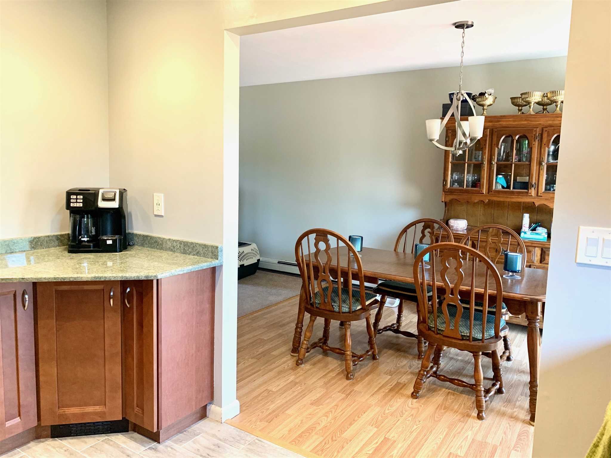 6 Academy Street Beacon, NY 12508 - Photo 7 of 22 a view of a dining room with furniture and wooden floor