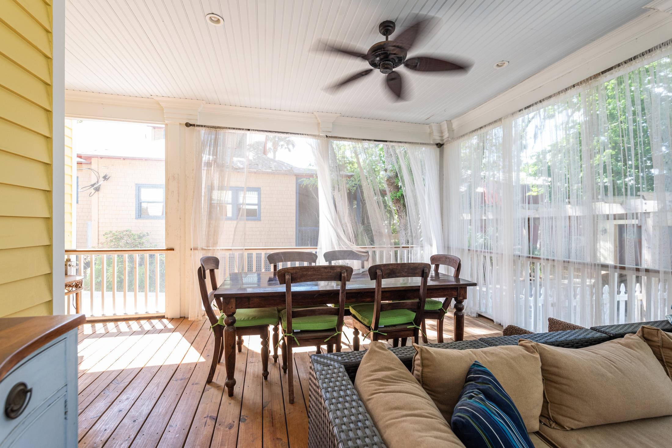 288 St George Street St. Augustine, FL 32084 - Photo 16 of 65 a living room with furniture and a large window