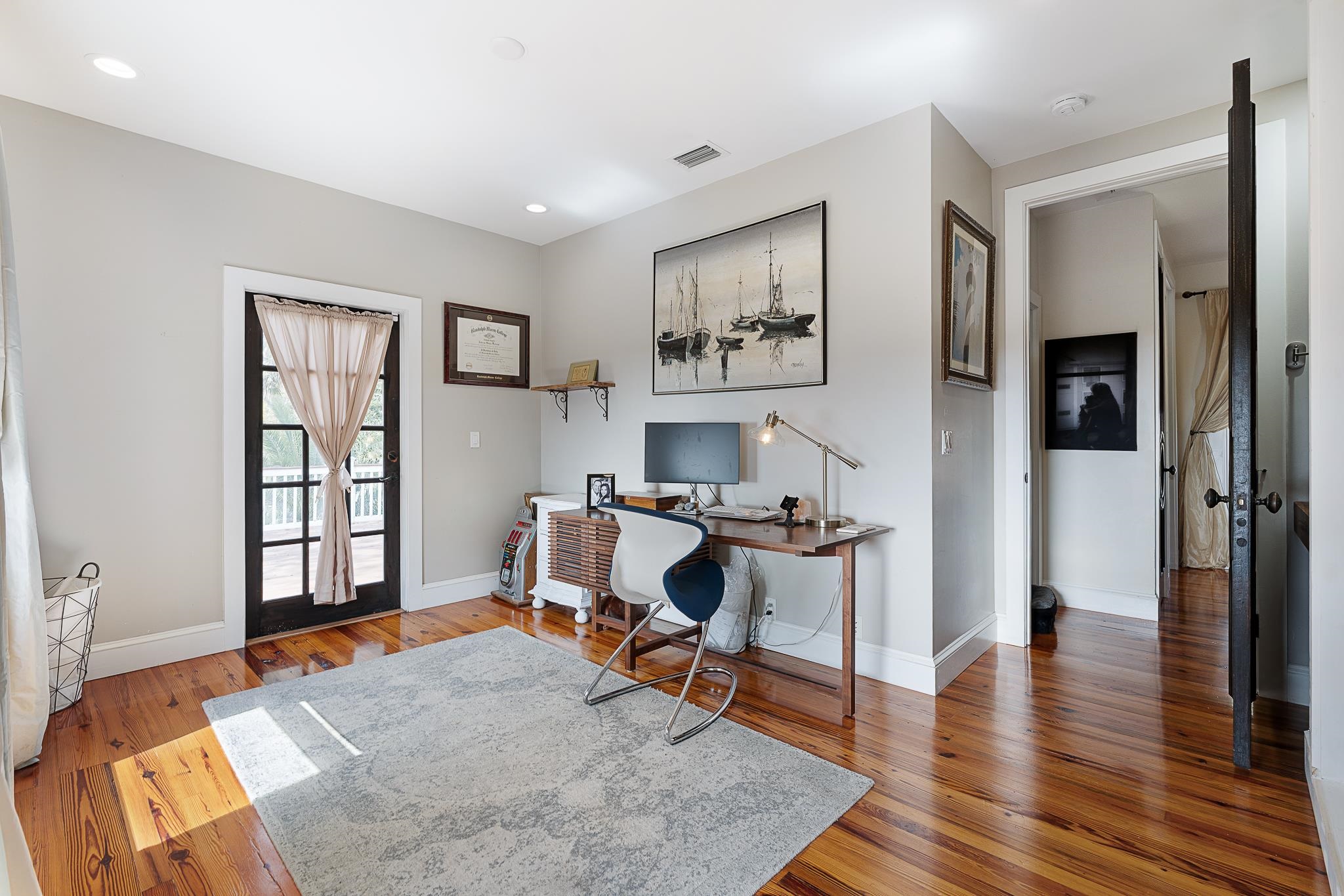 288 St George Street St. Augustine, FL 32084 - Photo 41 of 65 a workspace with furniture and wooden floor