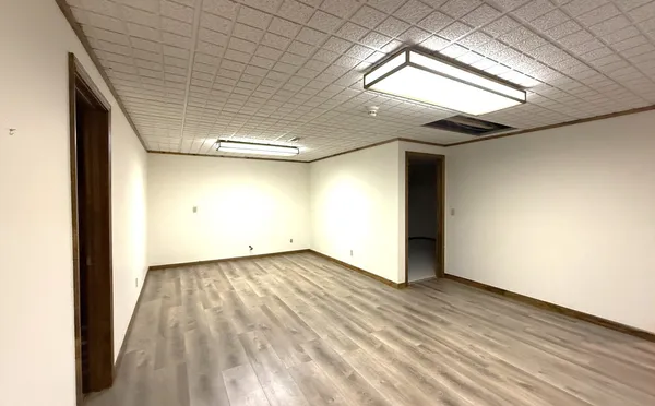 an empty room with windows