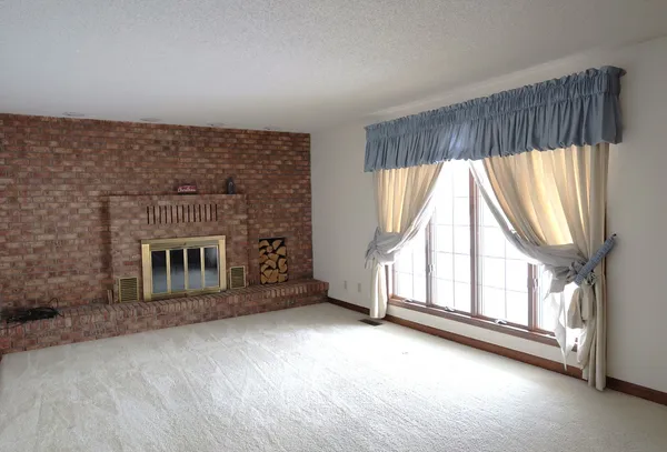 an empty room with windows