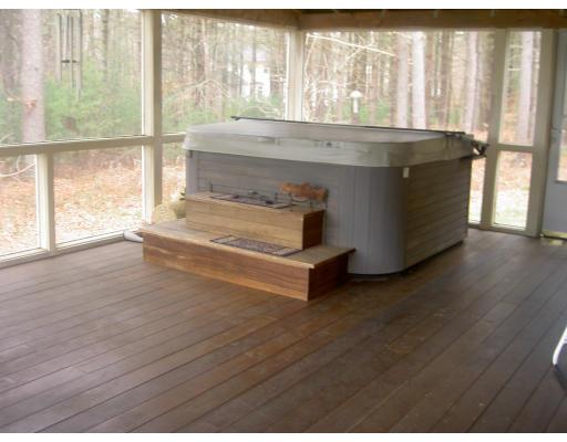 5 Gerrish Road Rochester, MA 02770 - Photo 4 of 10 a room with wooden floor and a window