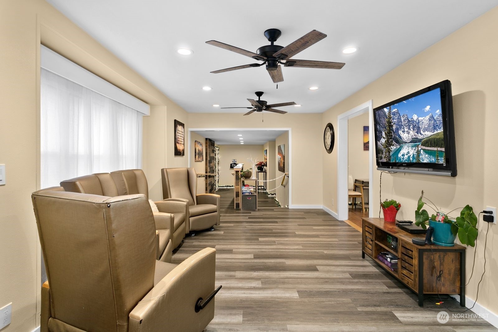 1402 North 28th Street Renton, WA 98056 - Photo 5 of 29 a living room with furniture and a flat screen tv