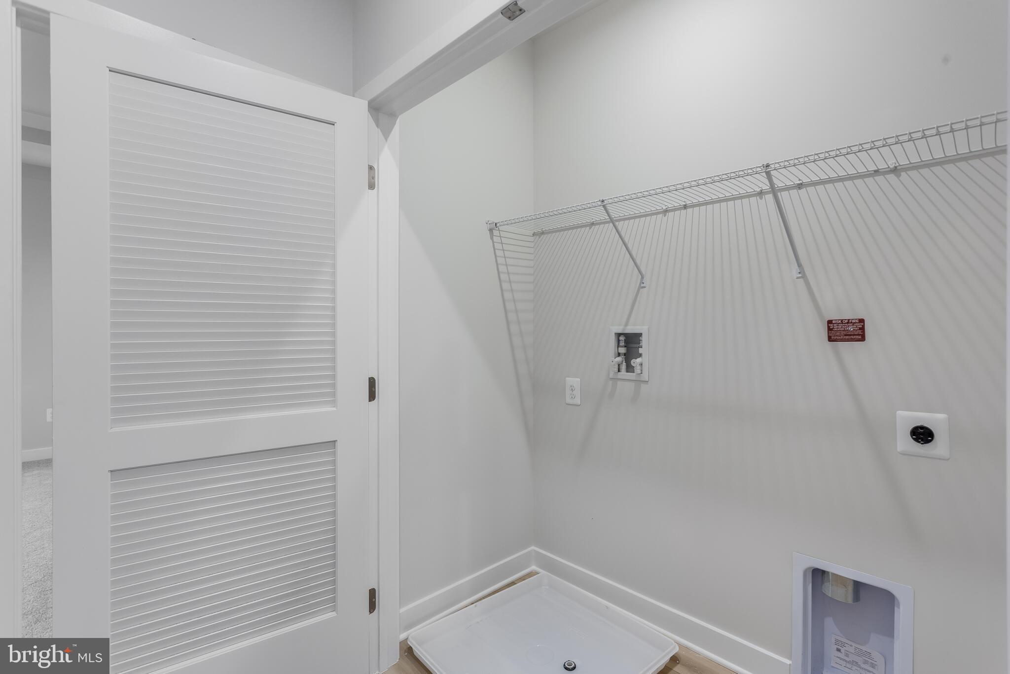 1721 Destrier Street Ranson, WV 25438 - Photo 23 of 24 Upstairs Laundry Room
