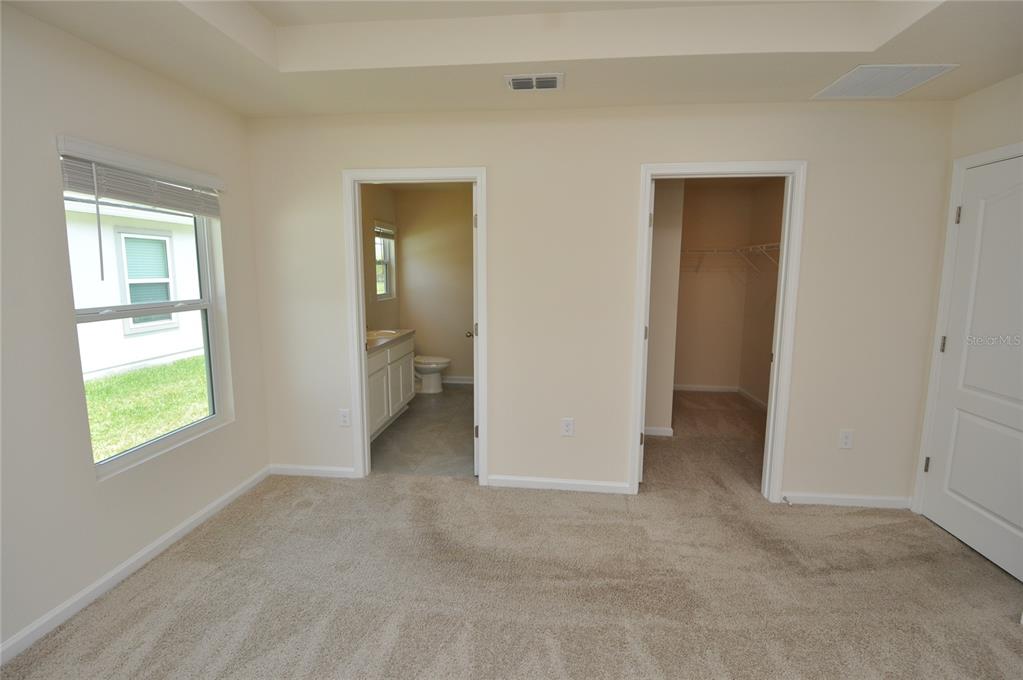 80 Oakleaf Way Palm Coast, FL 32137 - Photo 18 of 33 a view of an empty room and window