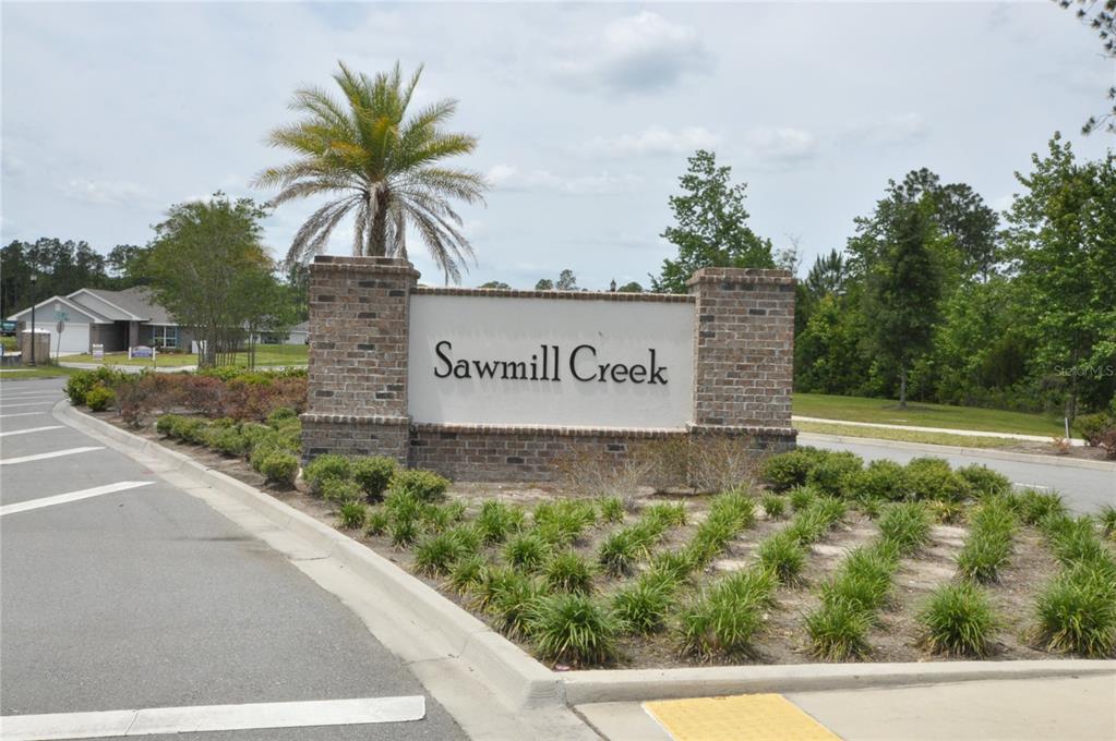 80 Oakleaf Way Palm Coast, FL 32137 - Photo 31 of 33 a view of outdoor space with garden