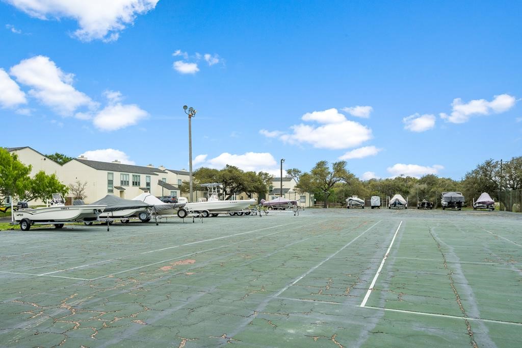 2003 North Fulton Beach Road, Unit 34 34 Rockport, TX 78382 - Photo 38 of 38 a view of an outdoor space and tennis court