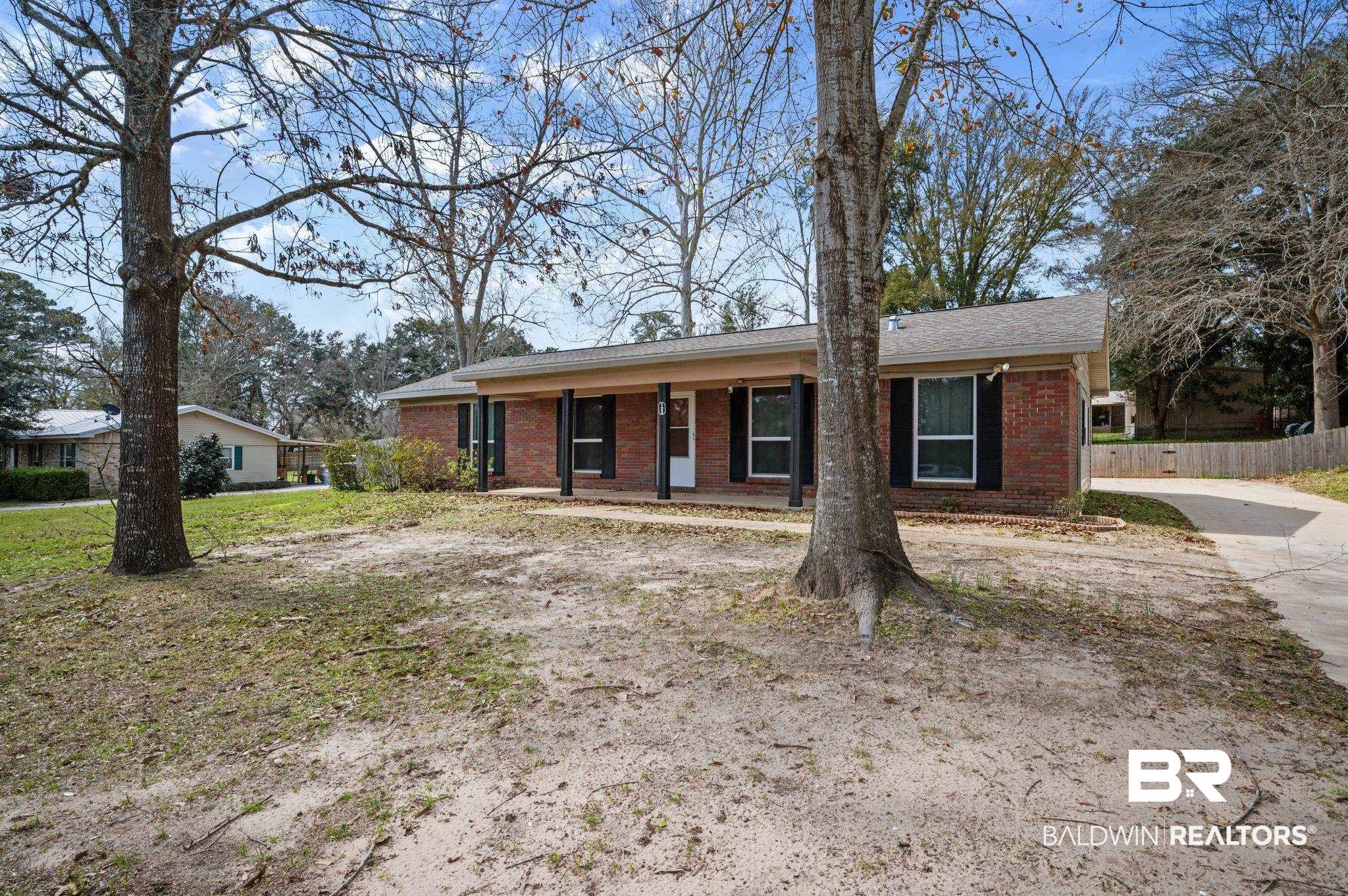 122 Rita Avenue Spanish Fort, AL 36527 - Photo 2 of 17 Single story home featuring brick siding and fence