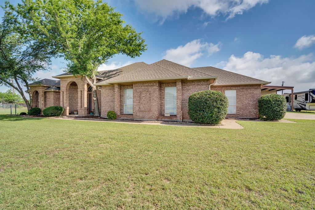 431 Mc Alpin Road Midlothian, TX 76065 - Photo 5 of 18 Brick exterior with an arched entryway and covered front porch