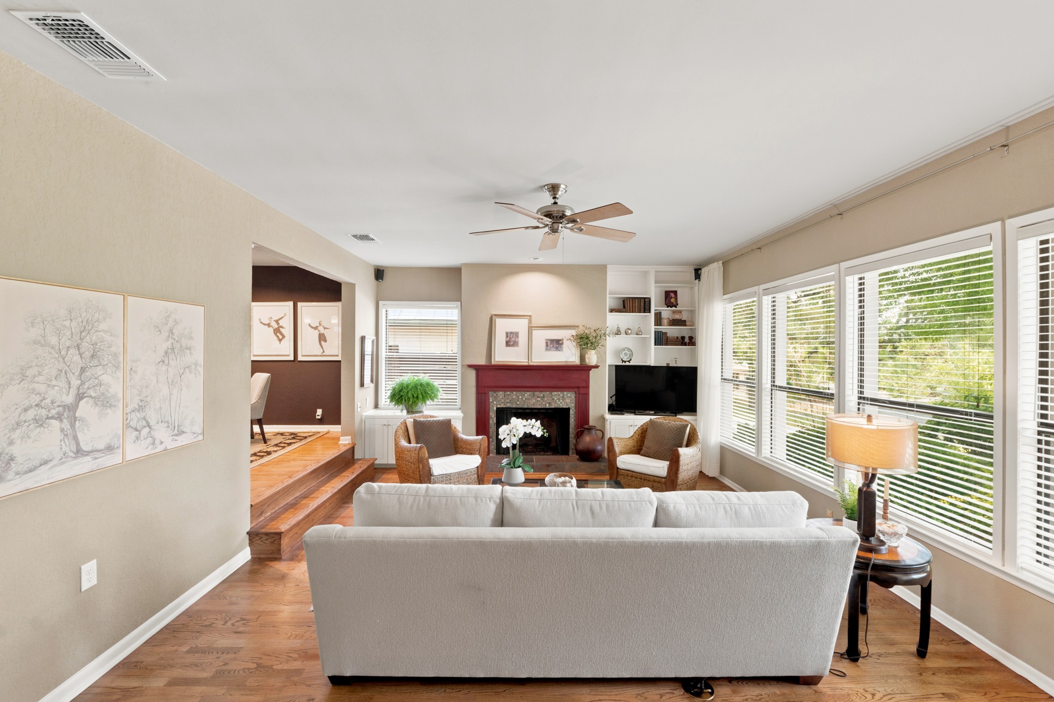 1904 Stoneridge Road Austin, TX 78746 - Photo 5 of 40 Spacious sunken living area offers an easy flow between the entry, dining spaces and adjoining rooms.