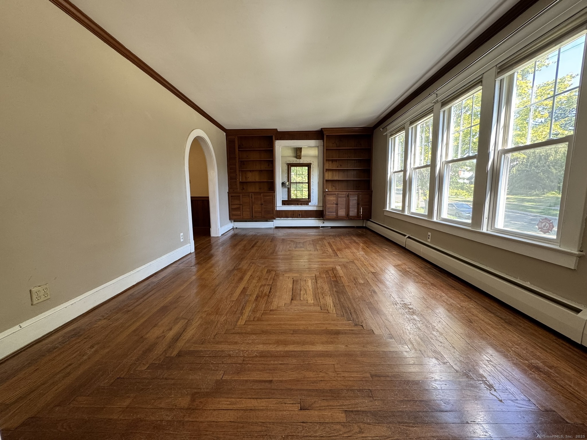 16 Park Place Meriden, CT 06451 - Photo 11 of 30 a view of an empty room with wooden floor and a window