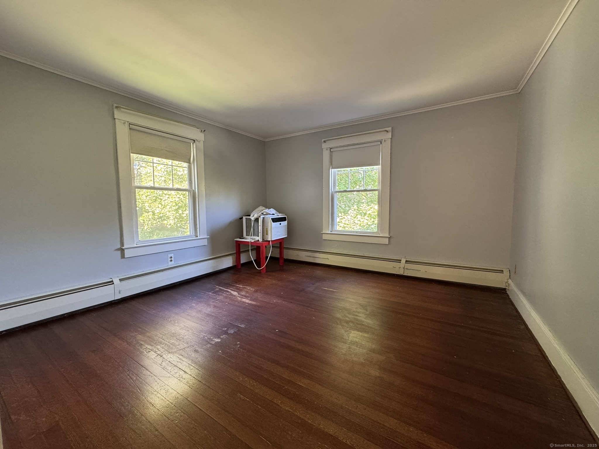 16 Park Place Meriden, CT 06451 - Photo 20 of 30 an empty room with wooden floor and windows