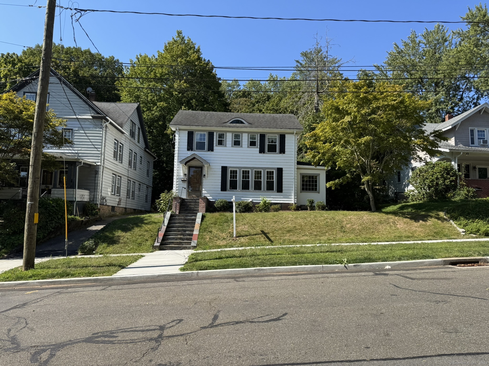 16 Park Place Meriden, CT 06451 - Photo 2 of 30 a view of a house with a swimming pool