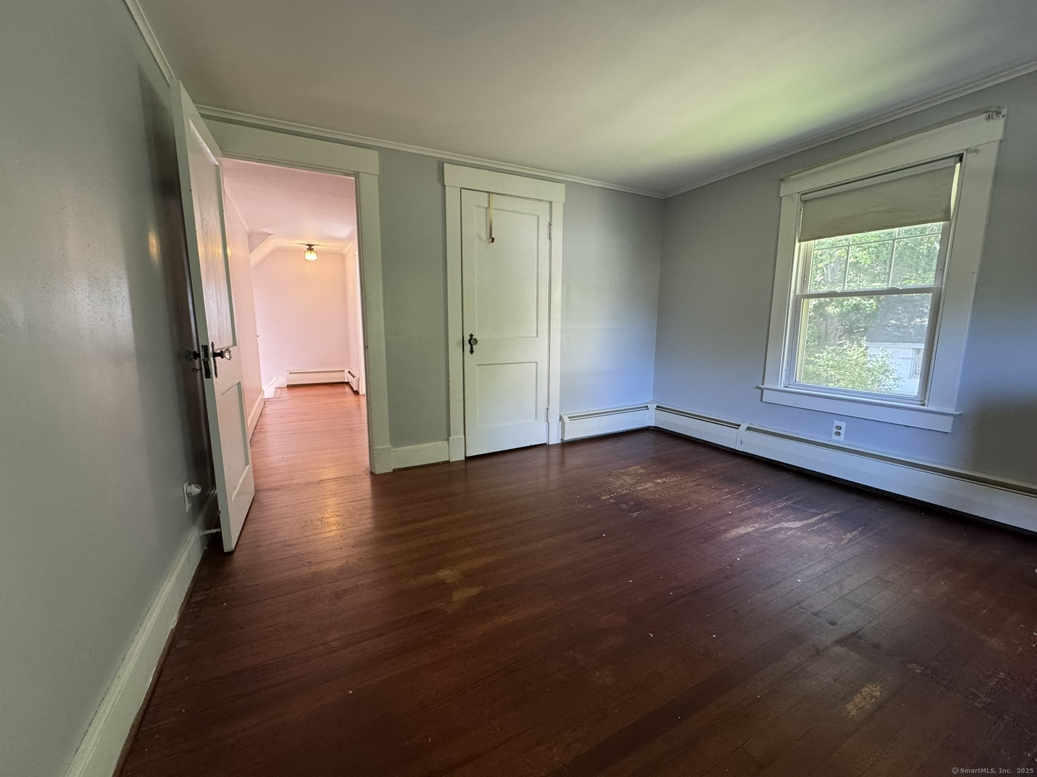 16 Park Place Meriden, CT 06451 - Photo 21 of 30 an empty room with wooden floor and windows