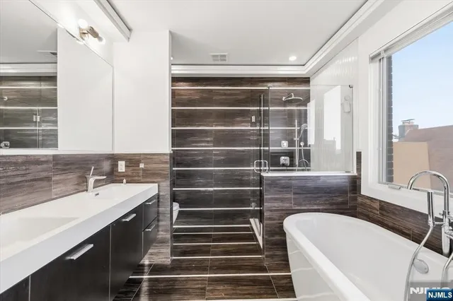 a bathroom with a sink and a bathtub
