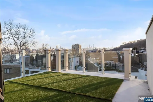 a view of a building with yard