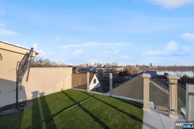 a view of a lake with a building in the background