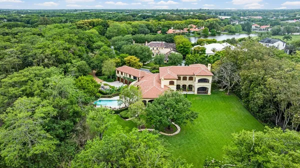 an aerial view of a house with yard and outdoor space