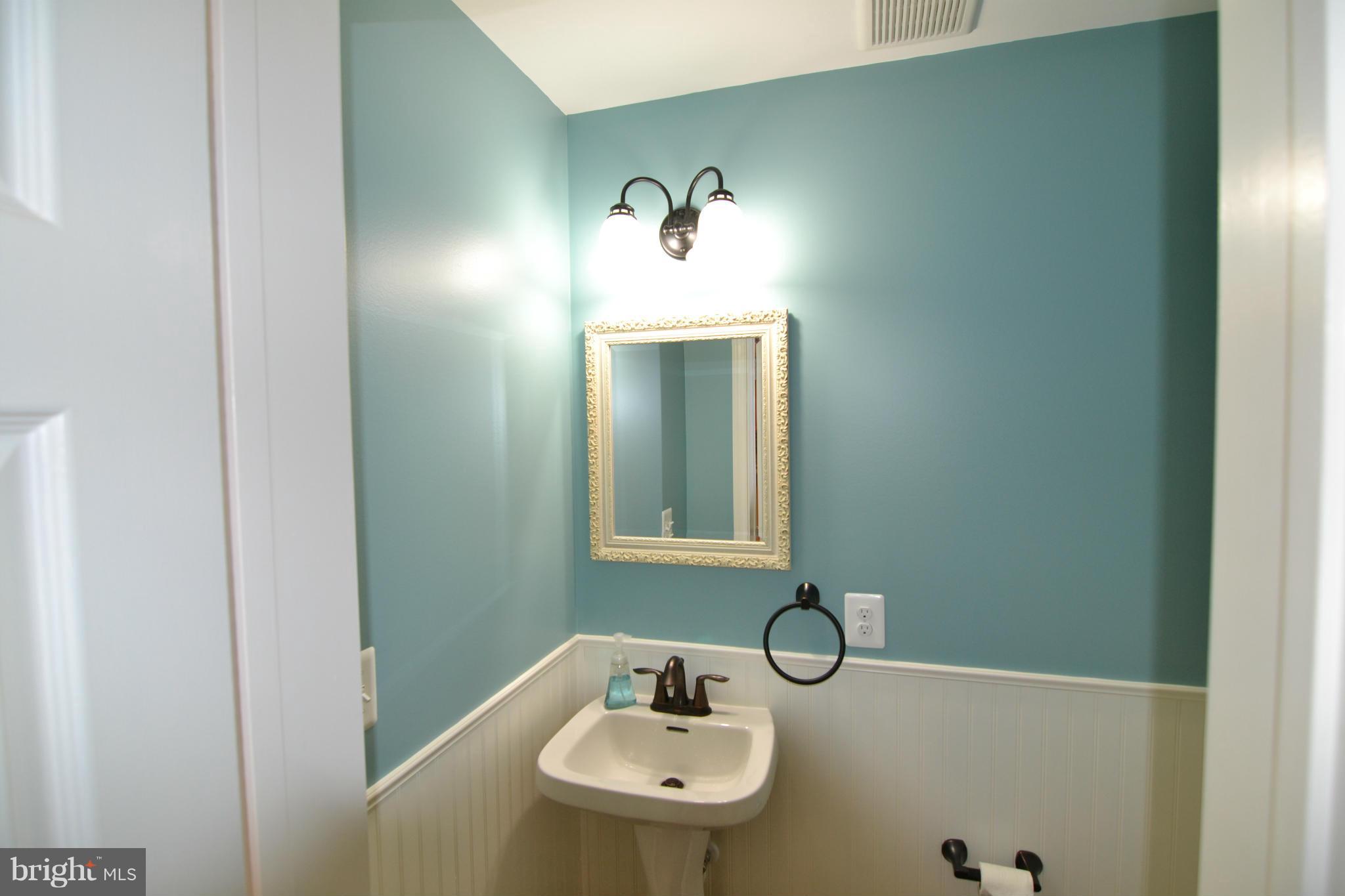1629 Old Manchester Road Westminster, MD 21157 - Photo 22 of 30 a bathroom with a sink and a mirror
