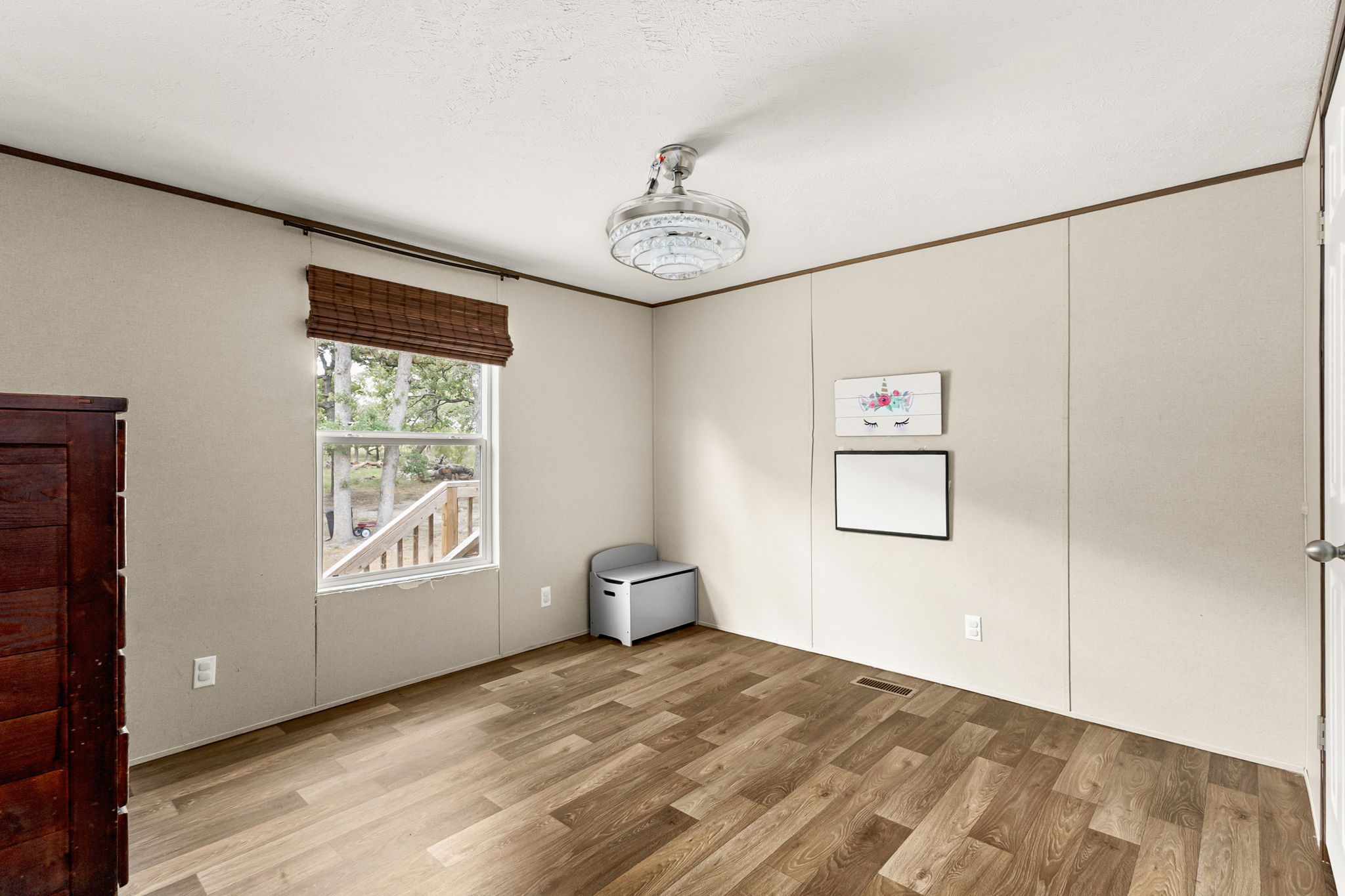 161 High Point Ridge Seguin, TX 78155 - Photo 14 of 23 a view of a bedroom with a bed and a window