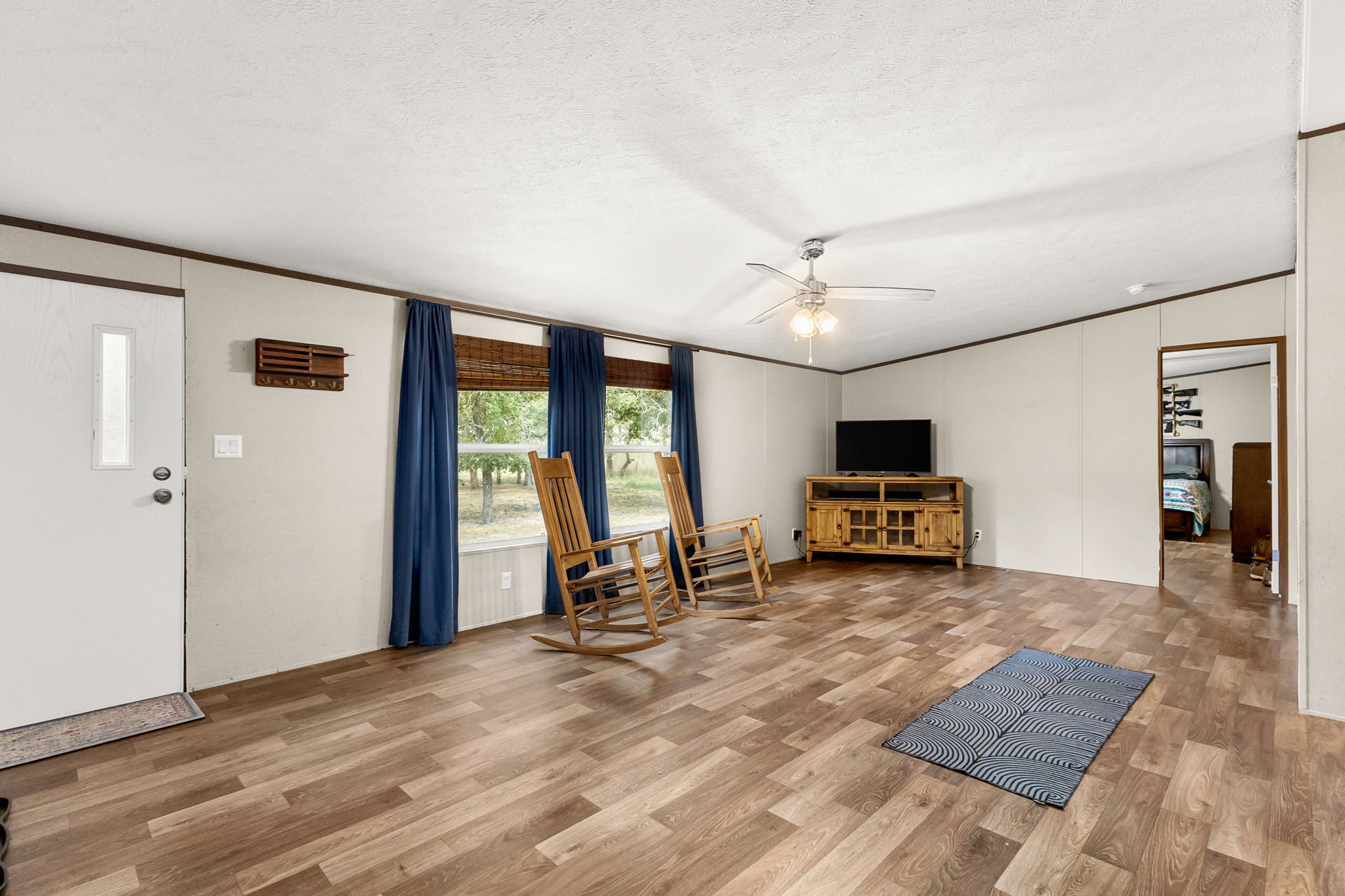 161 High Point Ridge Seguin, TX 78155 - Photo 6 of 23 a view of a livingroom with furniture and a ceiling fan