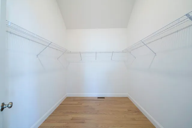 a view of a room with racks on the wall