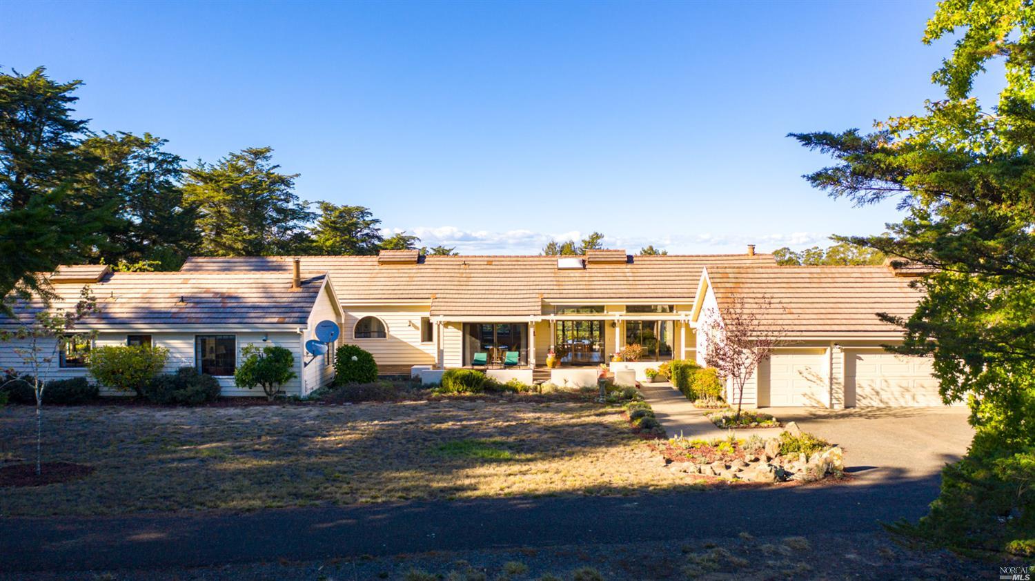 4342 Burnside Road Sebastopol, CA 95472 - Photo 1 of 1 a view of a house with yard and lake view