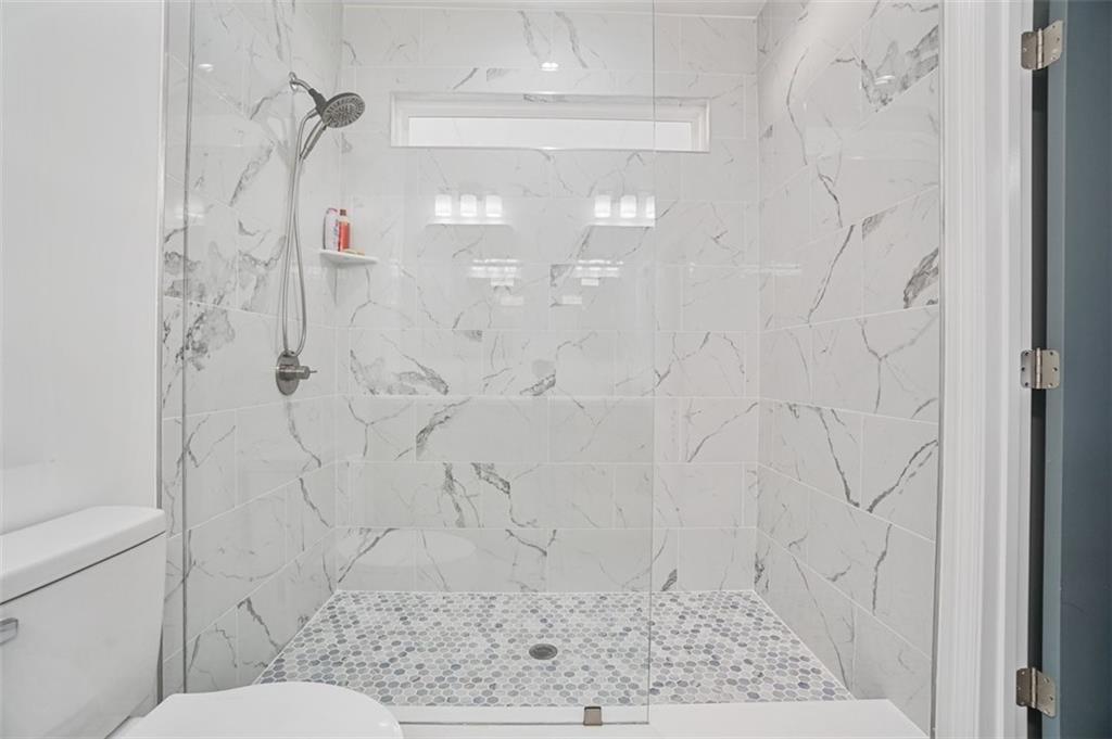 3510 Thompson Drive Northwest Atlanta, GA 30331 - Photo 11 of 28 a bathroom with a shower and toilet