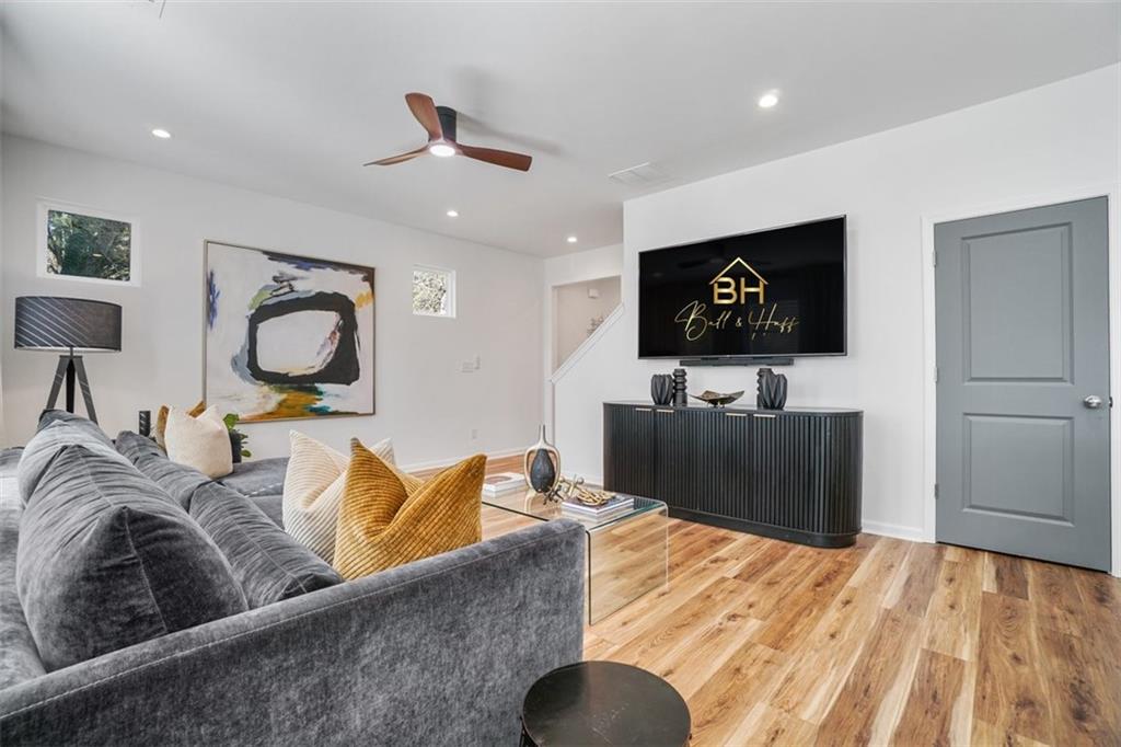3510 Thompson Drive Northwest Atlanta, GA 30331 - Photo 15 of 28 a living room with furniture and a flat screen tv