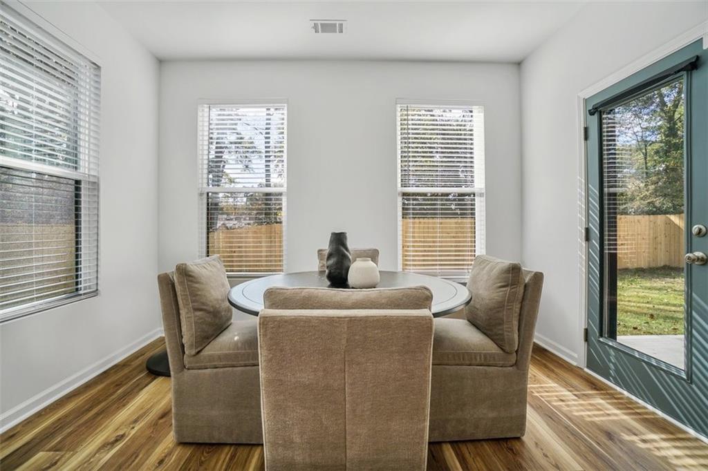 3510 Thompson Drive Northwest Atlanta, GA 30331 - Photo 19 of 28 a dining room with furniture and windows