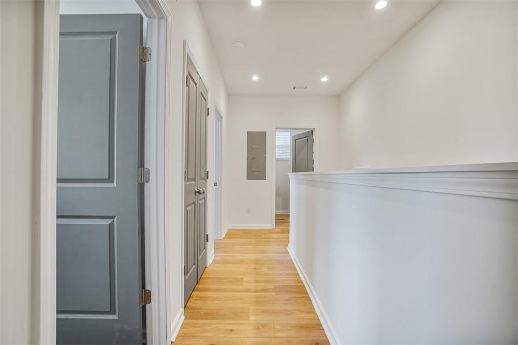 3510 Thompson Drive Northwest Atlanta, GA 30331 - Photo 21 of 28 a view of a hallway with wooden floor